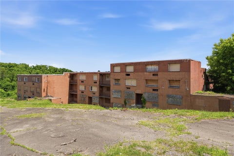 Photo of 741 Camp Hollow Rd, West Mifflin, PA 15122 (MLS # 1761245)