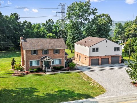 Photo of 1217-1219 Old Leechburg Rd, Pittsburgh, PA 15239 (MLS # 1740397)