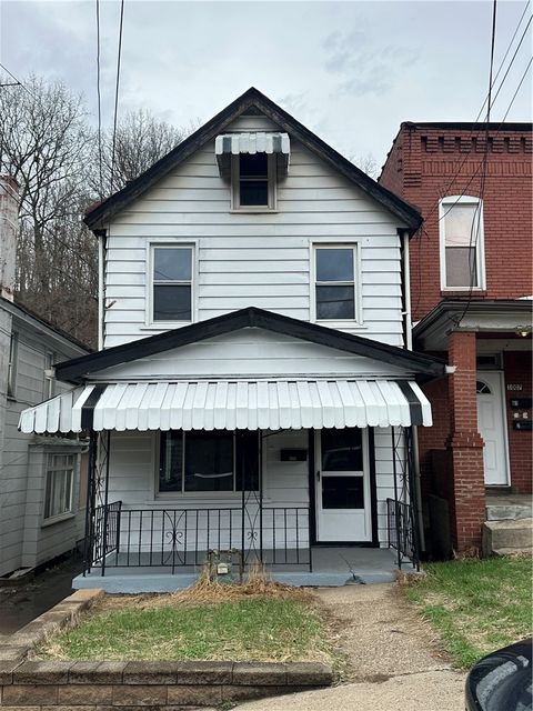 Photo of 1005 Oak Ave, Turtle Creek, PA 15145 (MLS # 1743727)