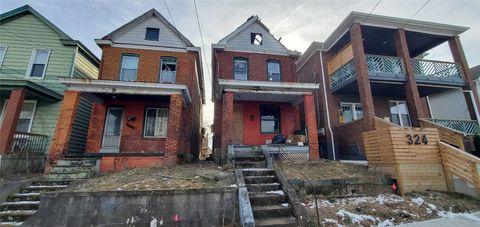 Photo of 320 W 14th Ave, Homestead, PA 15120 (MLS # 1738690)