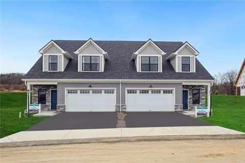 Photo of 1011 Autumn Woods Dr, Evans City, PA 16033 (MLS # 1750394)