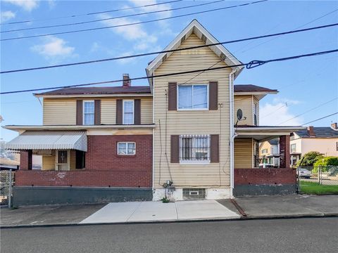 Photo of 201 Comrie Ave, Braddock, PA 15104 (MLS # 1749430)