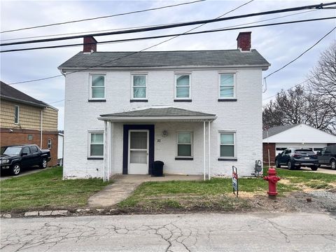 Photo of 24 N Mill St, New Salem, PA 15468 (MLS # 1745862)