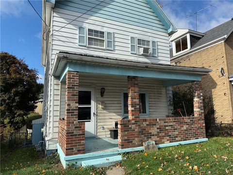 Photo of 510 Harrison Ave, Jeannette, PA 15644 (MLS # 1729092)