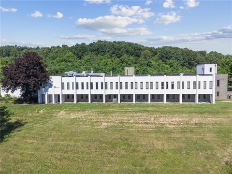 Photo of 520 Pleasant Valley Rd, Trafford, PA 15085 (MLS # 1762399)