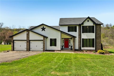 Photo of 317 Fassinger Rd, Evans City, PA 16033 (MLS # 1751141)