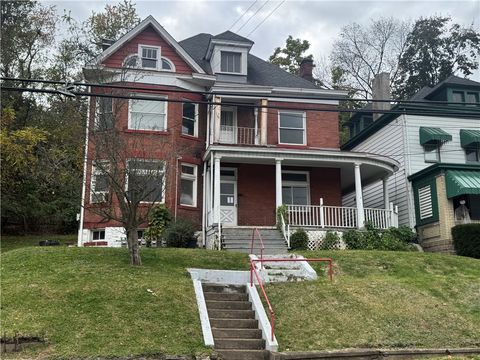 Photo of 221 Singer Ave, Mc Kees Rocks, PA 15136 (MLS # 1726943)
