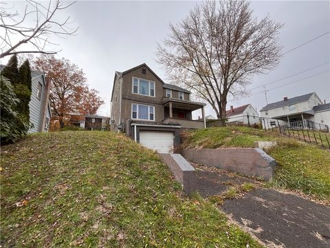 Photo of 321 E Garfield Ave, New Castle, PA 16105 (MLS # 1732572)
