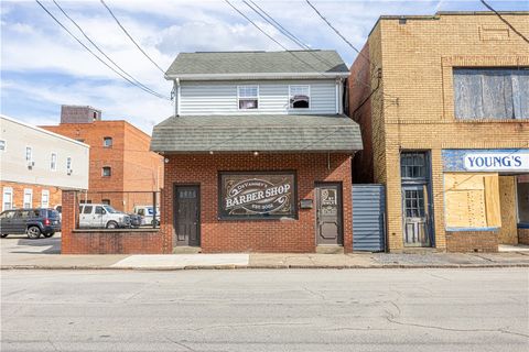 Photo of 63 S Gallatin Ave, Uniontown, PA 15401 (MLS # 1742904)