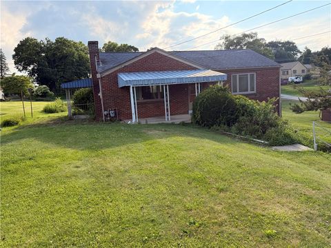 Photo of 31 Ewing Rd, Mc Kees Rocks, PA 15136 (MLS # 1764030)