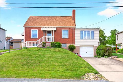 Photo of 1715 Morton Ave, West Mifflin, PA 15122 (MLS # 1752024)