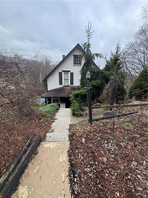 Photo of 839 Larimer Ave, Turtle Creek, PA 15145 (MLS # 1743864)