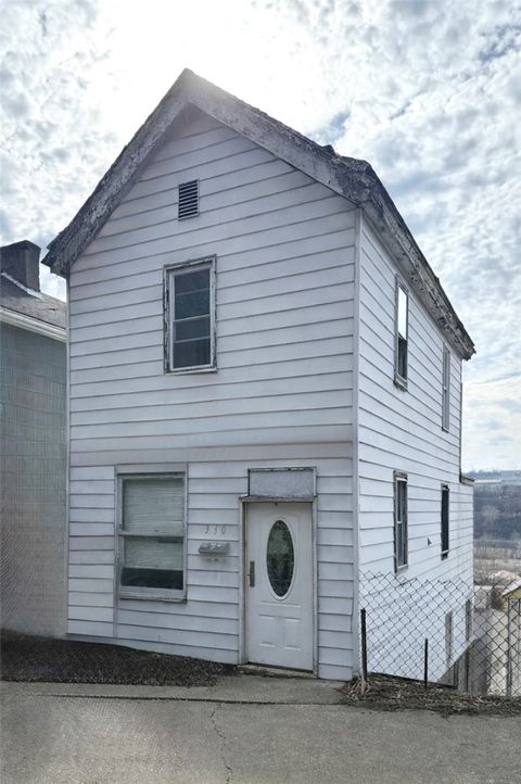 Photo of 330 Iowa Ave, Glassport, PA 15045 (MLS # 1745687)