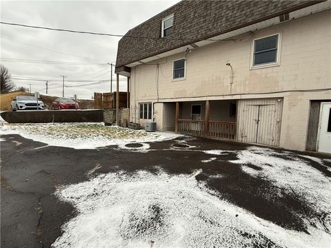 Photo of 825 10th Ave, Brackenridge, PA 15014 (MLS # 1738016)