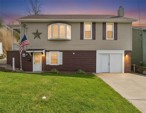 Photo of 410 Madison Ave, Herminie, PA 15637 (MLS # 1750439)