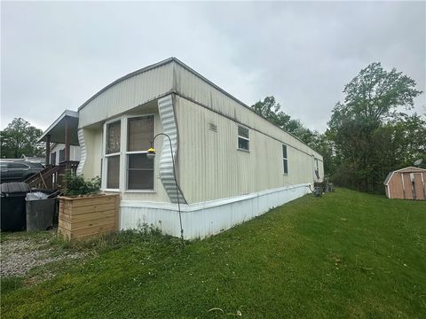 Photo of 346 Calico Lane, Jeannette, PA 15644 (MLS # 1750434)