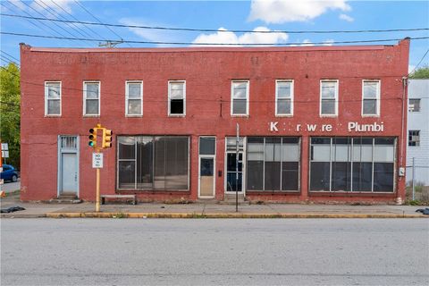 Photo of 205 Braddock Ave, Braddock, PA 15104 (MLS # 1726628)