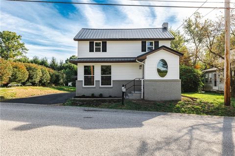 Photo of 237 Connoquenessing Main Street Dr, Evans City, PA 16033 (MLS # 1723825)