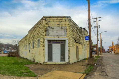 Photo of 97 Helen St, Mc Kees Rocks, PA 15136 (MLS # 1744972)