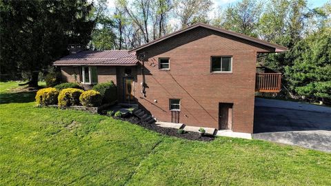 Photo of 305 Upper Middletown Rd, Smock, PA 15480 (MLS # 1749528)