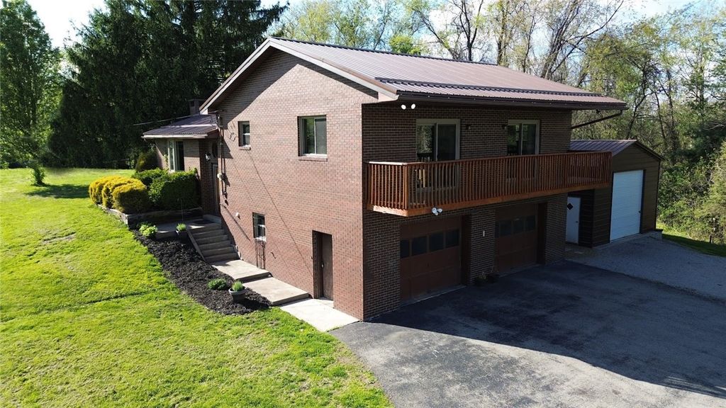 Photo of 305 Upper Middletown Rd, Smock, PA 15480 (MLS # 1749528)