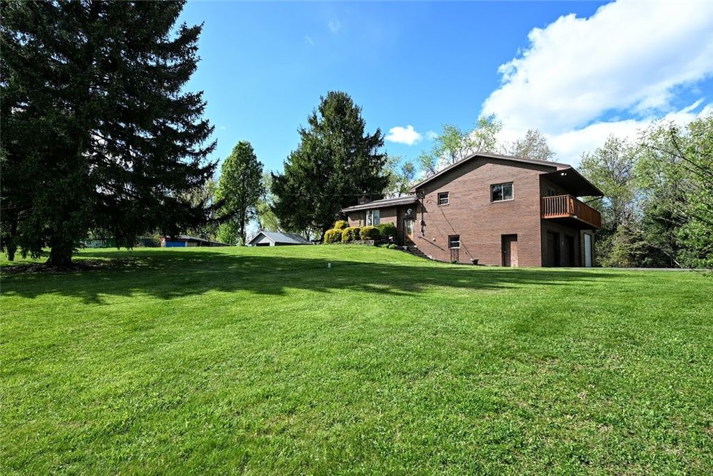 Photo of 305 Upper Middletown Rd, Smock, PA 15480 (MLS # 1749528)