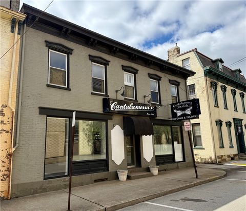 Photo of 9 1/2-11 W Church, Uniontown, PA 15401 (MLS # 1747982)