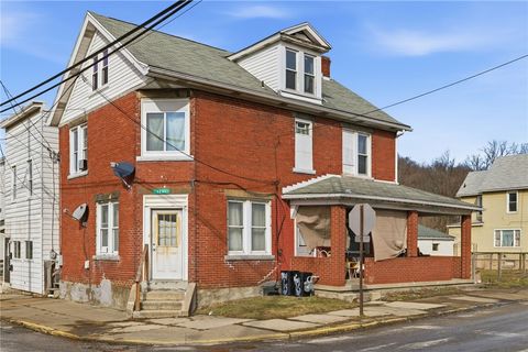Photo of 1301-1301.5 Penn Avenue St, Jeannette, PA 15644 (MLS # 1738017)
