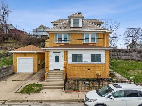 Photo of 701 Cowan Ave, Jeannette, PA 15644 (MLS # 1747522)