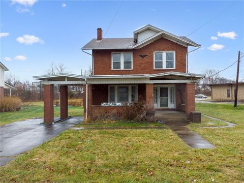 Photo of 132 W Pennsylvania Ave, New Stanton, PA 15672 (MLS # 1735152)