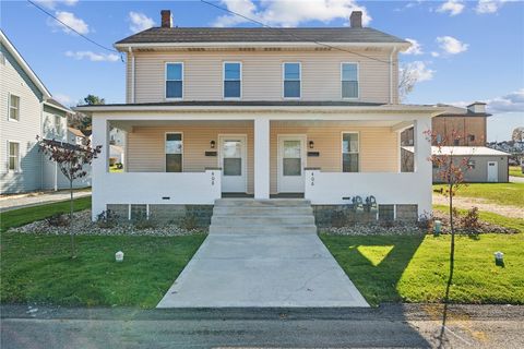 Photo of 406-408 Church St #406-408, Herminie, PA 15637 (MLS # 1730213)