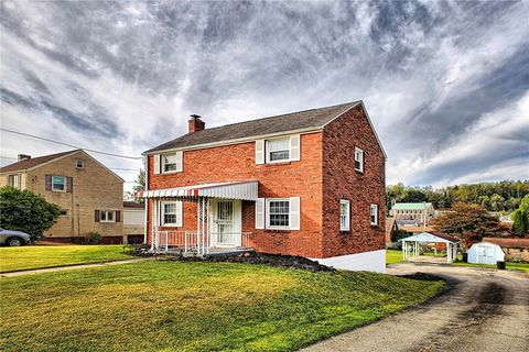 Photo of 1608 Kansas Ave, White Oak, PA 15131 (MLS # 1724154)