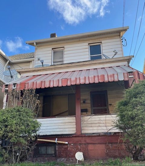 Photo of 15 Holland Ave, Braddock, PA 15104 (MLS # 1747472)