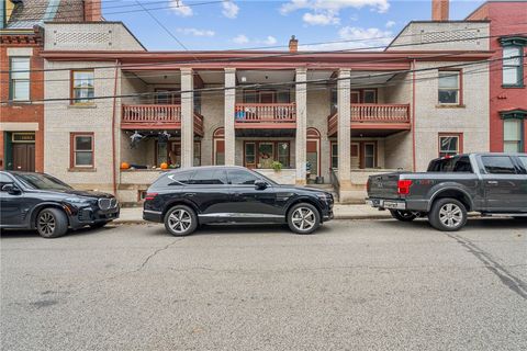 Photo of 1605-1609 Brighton Pl, Pittsburgh, PA 15212 (MLS # 1729112)