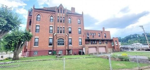 Photo of 704 Market St, Mckeesport, PA 15132 (MLS # 1729696)