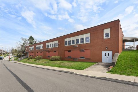 Photo of 219 W Schwab Ave, Munhall, PA 15120 (MLS # 1727608)