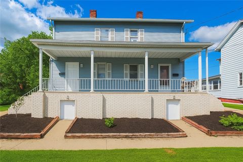 Photo of 832-834 Washington St, Mt Pleasant, PA 15666 (MLS # 1726953)
