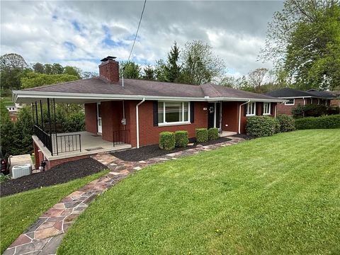 Photo of 313 Crest Ave, Rostraver, PA 15012 (MLS # 1751234)