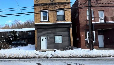 Photo of 554 Larimer Ave, Turtle Creek, PA 15145 (MLS # 1740558)