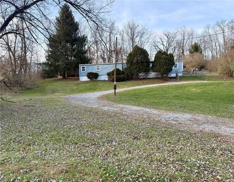 Photo of 233 Huntingdon Rd, Ruffs Dale, PA 15679 (MLS # 1732346)