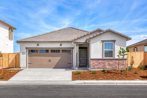 Photo of 809 Chatham Lane, Patterson, CA 95363 (MLS # 226040435)