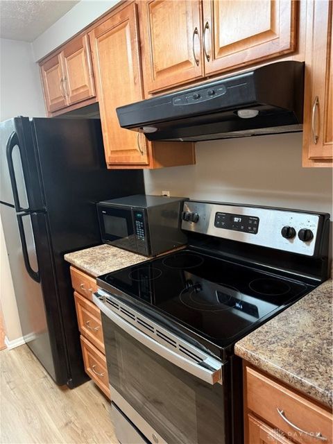 Photo of 1109 Arrowhead Crossing #A, West Carrollton, OH 45449 (MLS # 948420)