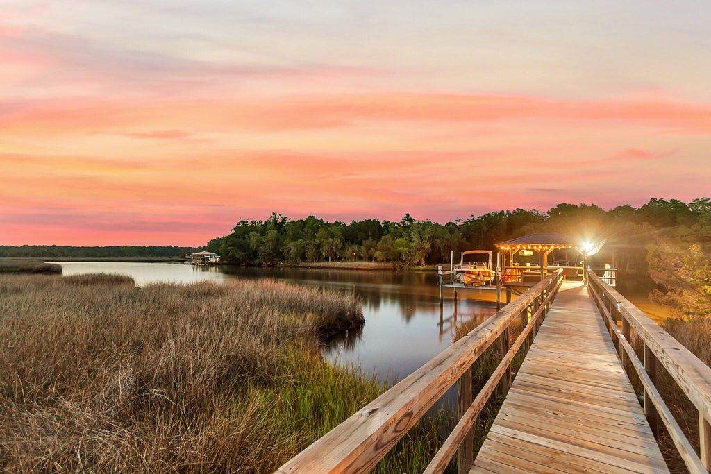 Photo of 4385 Ten Shillings Way, Ravenel, SC 29470 (MLS # 25027150)