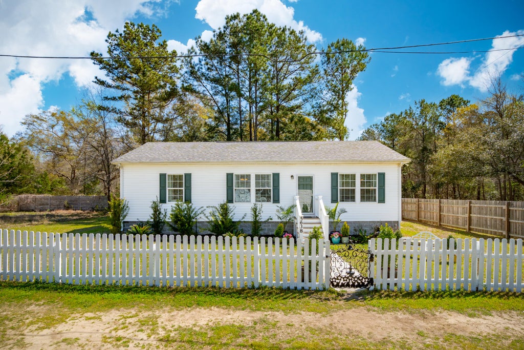 Photo of 5638 Dixie Plantation Road, Hollywood, SC 29449 (MLS # 26028205)