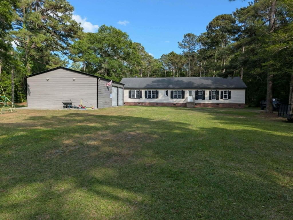 Photo of 717 Huskie Lane, Saint Stephen, SC 29479 (MLS # 26012320)