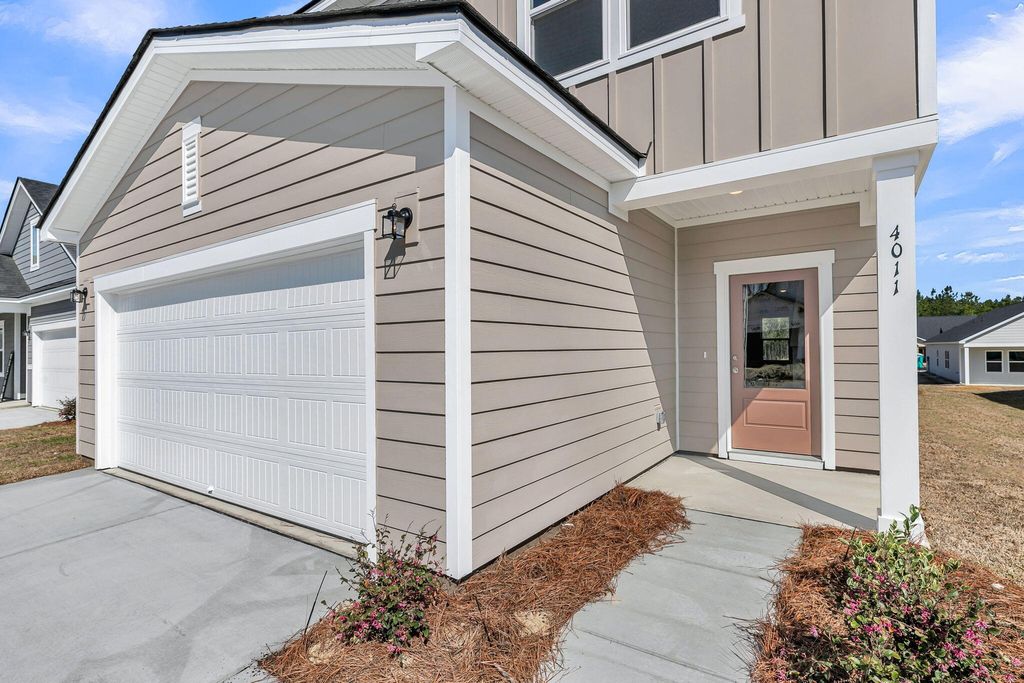 Photo of 4022 Lemon Grass Lane, Ravenel, SC 29470 (MLS # 26013707)