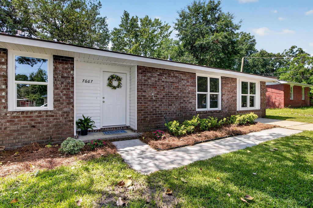 Photo of 7667 Mendelwood Drive, North Charleston, SC 29418 (MLS # 26024169)