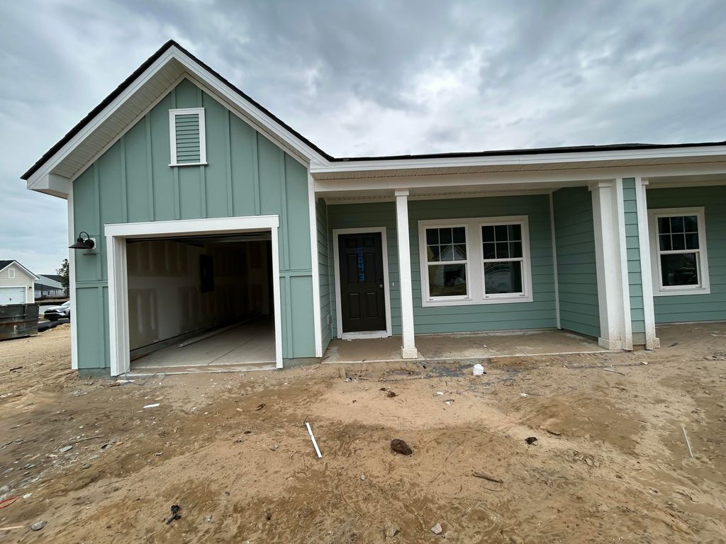Photo of 5043 Blackberry Lane Lane, Ravenel, SC 29470 (MLS # 26000588)