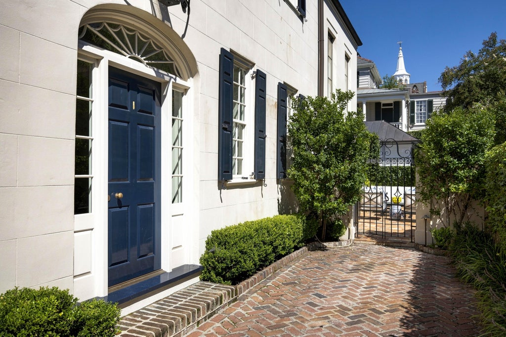 Photo of 64 Tradd Street, Charleston, SC 29401 (MLS # 26025532)
