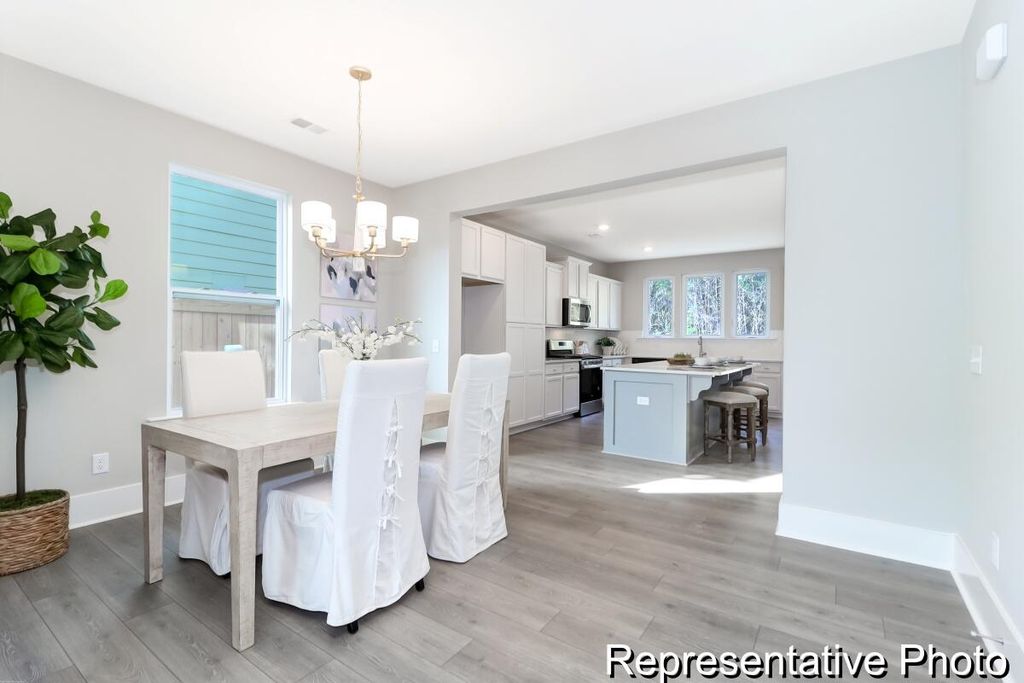 Photo of 1002 Hooded Warbler Way #Cc3-6-1p, Ravenel, SC 29470 (MLS # 26006487)